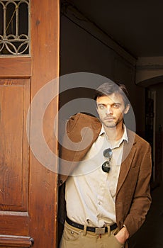 Handsome male model in a doorway