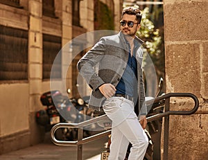 Handsome male model in fashionable clothes photo