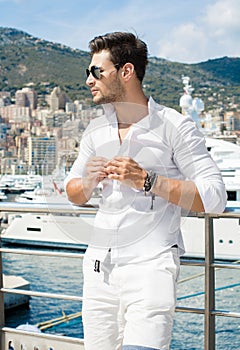 Handsome male model in port