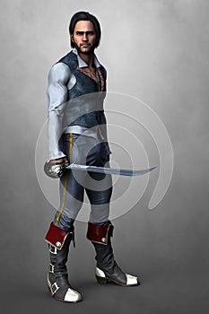 Handsome male pirate wearing swashbuckling costume and holding a cutlass sword