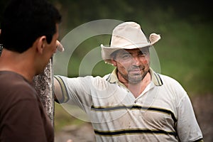 Handsome male ranch hands in Costa Rica photo
