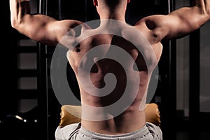 Handsome Man Athlete Doing Pull Ups - Chin-Ups In The Gym