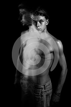 Handsome man black and white long exposure creative artistic portrait.