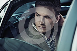 Handsome man in car photo