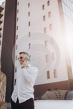 Handsome man cell phone call smile outdoor city street, Young attractive businessman casual blue shirt talking,middle