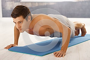 Handsome man doing push up