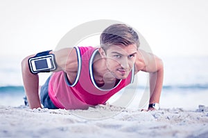 Handsome man doing push ups