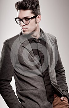 Handsome man dressed casual wearing glasses