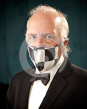 Handsome man dressed up wearing safety mask