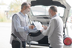 Handsome man driving car