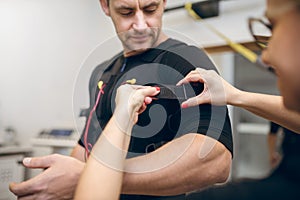 Handsome man getting prepared for ems training