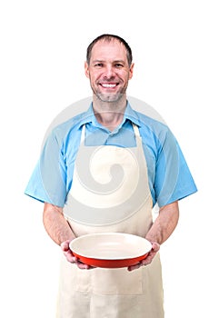 Handsome man holding a dish for your