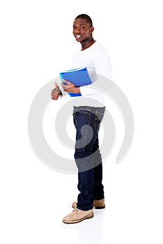Handsome man holding files. Student. Businessman.
