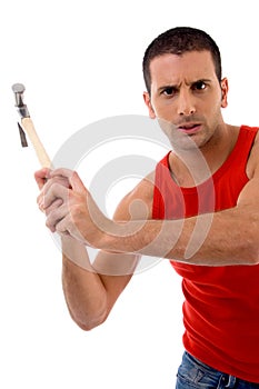 Handsome man holding hammer