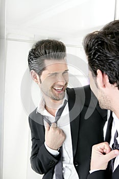 Handsome man humor funny gesture in a mirror