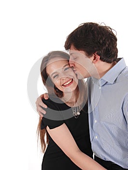 Handsome man kissing his girlfriend