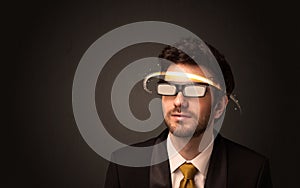 Handsome man looking with futuristic high tech glasses