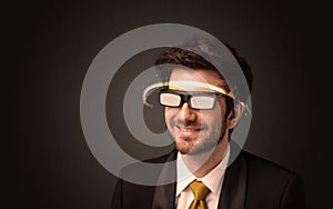 Handsome man looking with futuristic high tech glasses