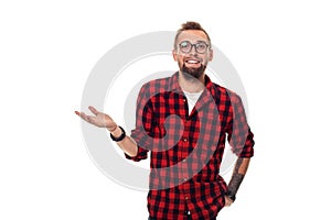 Handsome man model studio portrait. Boy casual style, trendy hipster in checkered shirt look with cool hairstyle
