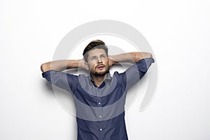 Handsome man over blue background