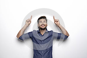 Handsome man over blue background