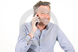 Handsome man over isolated white background keeping real conversation mobile phone