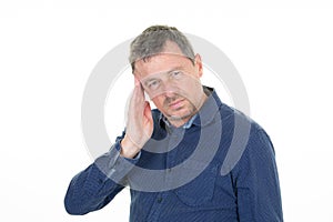 Handsome man in pain having headache hand on head on white background