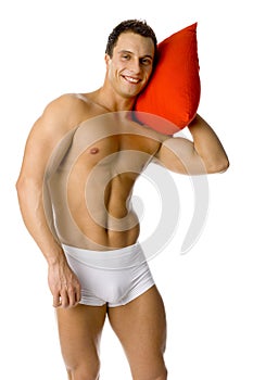 Handsome man with pillow photo