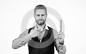 handsome man pointing finger on comb, hair salon
