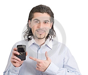 Handsome man pointing at his phone isolated white