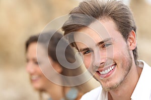 Handsome man portrait with a perfect white tooth and smile photo