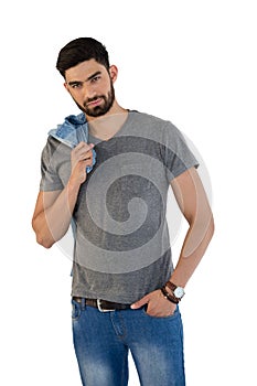 Handsome man posing against white background