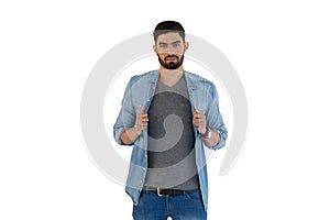 Handsome man posing against white background