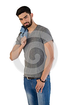 Handsome man posing against white background