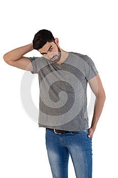 Handsome man posing against white background