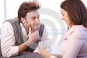 Handsome man proposing to woman