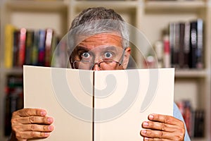 Handsome man reading