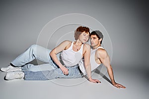 handsome man reclining on floor with