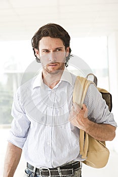 Handsome man with a rucksack photo