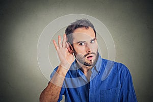 Handsome man secretly listening on private conversation