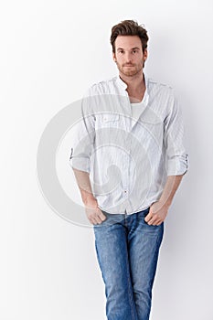 Handsome man in shirt and jeans