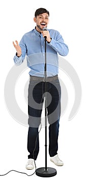 Handsome man singing in microphone