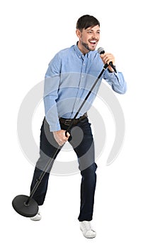 Handsome man singing in microphone