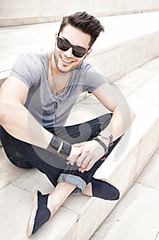 Handsome man smiling, dressed casual - outdoor