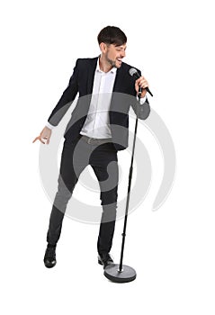 Handsome man in suit singing with microphone