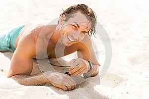 Handsome man at summer day, sexy guy at vacation