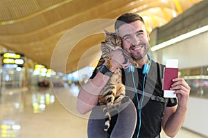 Handsome man traveling with his cat