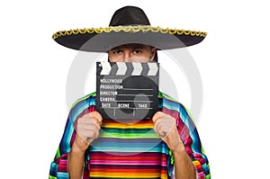 Handsome man in vivid poncho holding clapperboard