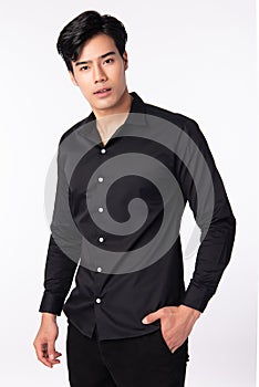 Handsome man wearing a Black shirt on white background