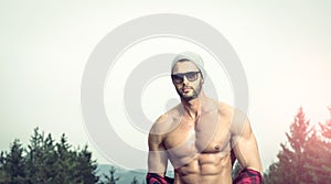 Handsome man wearing checked shirt outdoors